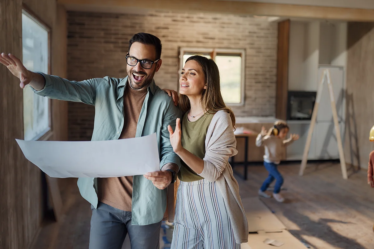 couple in home with renovation plans